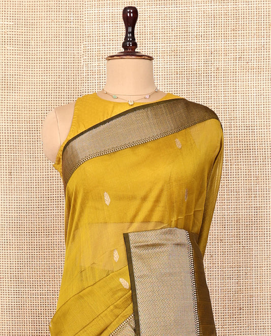 Mustrad Maheshwari Cotton Saree, Woven with Buttas All Over Its Body, Complemented by a Contrast Traditional Zari Design Border of Chevron Stripes, Pallu Steeped with Buttas, and Paired with a Contrast Blouse