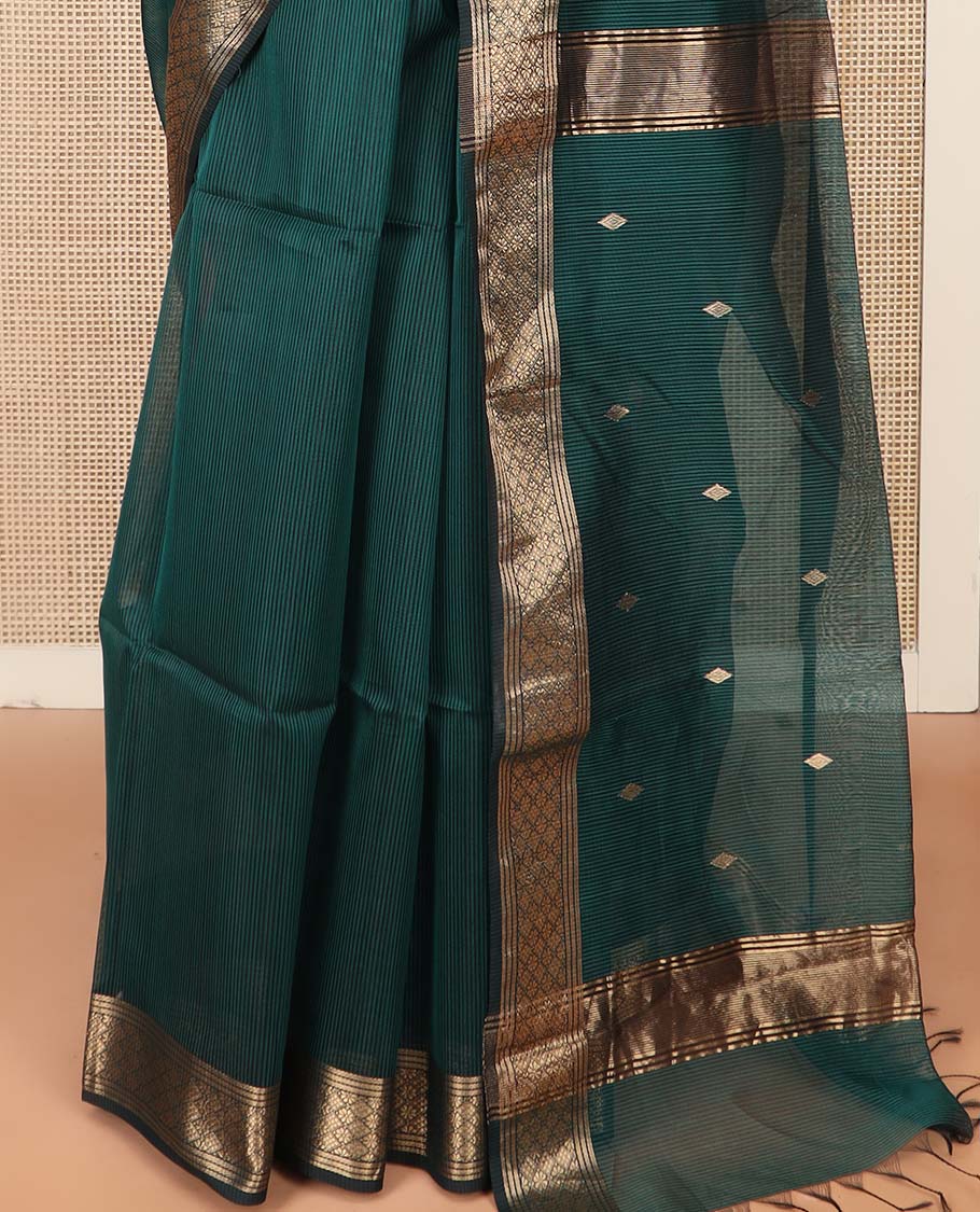 Green Maheshwari Cotton Saree Decorated with Diamond Zari Buttas, Highlighted with Traditional Zari Design Border, Pallu Steeped with Diamond Motifs, and Paired with a Matching Blouse