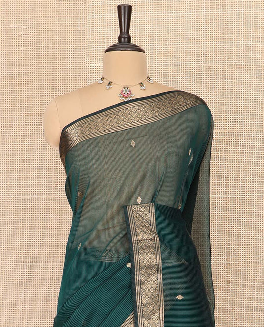 Green Maheshwari Cotton Saree Decorated with Diamond Zari Buttas, Highlighted with Traditional Zari Design Border, Pallu Steeped with Diamond Motifs, and Paired with a Matching Blouse