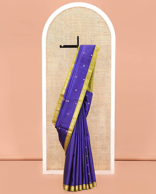 Blue Mayuri Soft Silk Saree, Spotlighted with Zari Buttas All Over Its Body, Complemented by Contrast Border of Salngai, Muthu, Banaras, and Kuyil Kann Designs, Grand Jaal Pallu and Paired with a Contrast Blouse