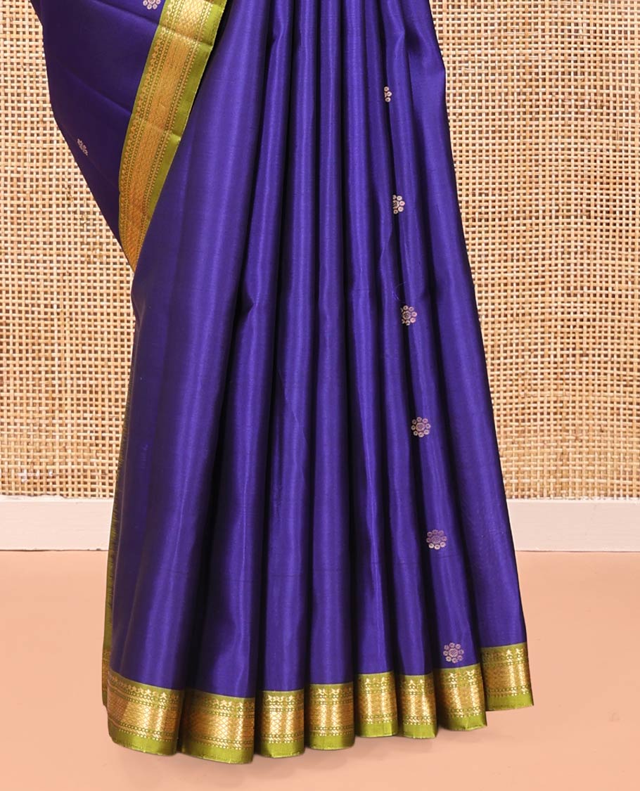 Blue Mayuri Soft Silk Saree, Spotlighted with Zari Buttas All Over Its Body, Complemented by Contrast Border of Salngai, Muthu, Banaras, and Kuyil Kann Designs, Grand Jaal Pallu and Paired with a Contrast Blouse