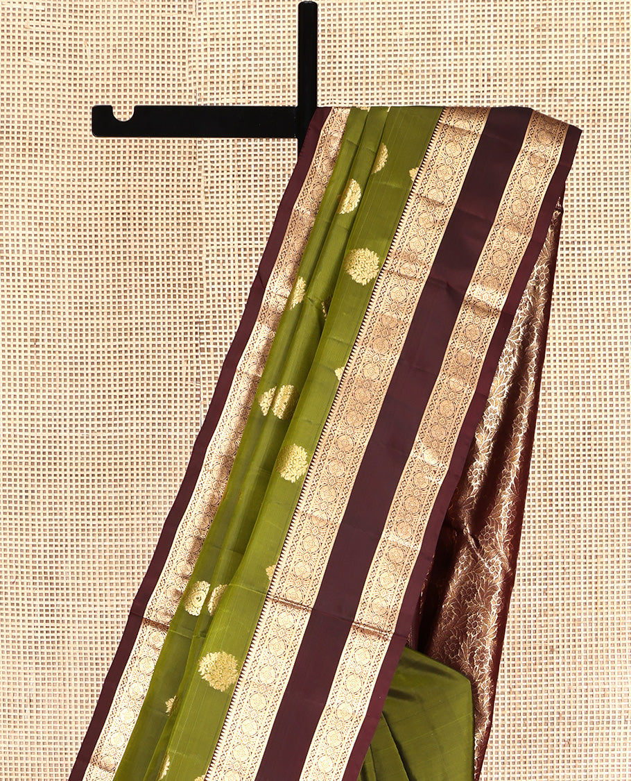 Green Mayuri Lite Silk Mix Saree, Ornamented with Zari Buttas All Over Its Body, Complemented by Contrast Zari Rettai Pettu Traditional Border, Floral Jaal Pallu, and Paired with a Contrast Blouse