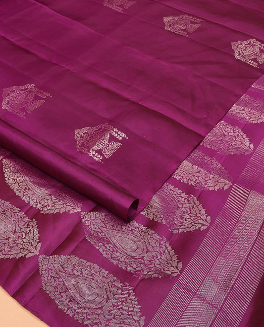 Borderless Purple Mayuri Soft Silk Saree Richly Detailed with Zari Buttas All Over Its Body, Highlighted by Grand Zari Woven Pallu Featuring Mughal-Style Designs, and Paired with a Matching Blouse