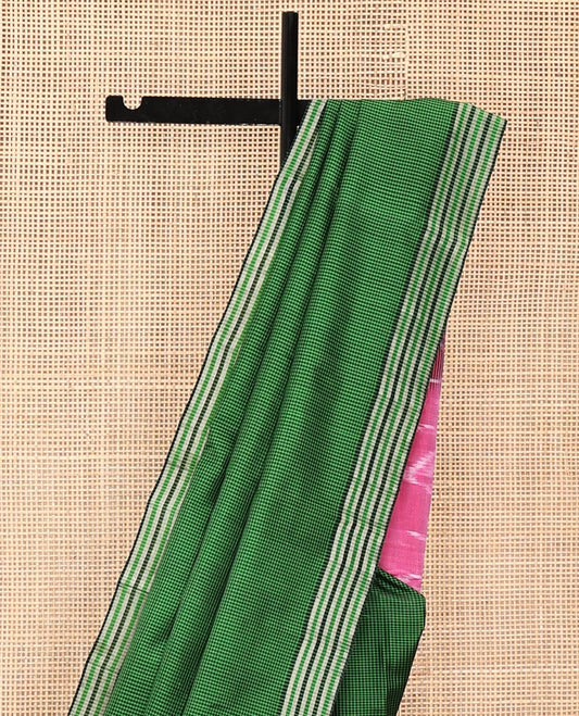 Green and Black Mayuri Soft Silk Saree, Subtly Sparkled with Kasa-Kasa Checks All Over Its Body, Highlighted by Zari Striped Border, Delicately Woven Pallu of Ikkat Texture, and Paired with a Contrast Blouse