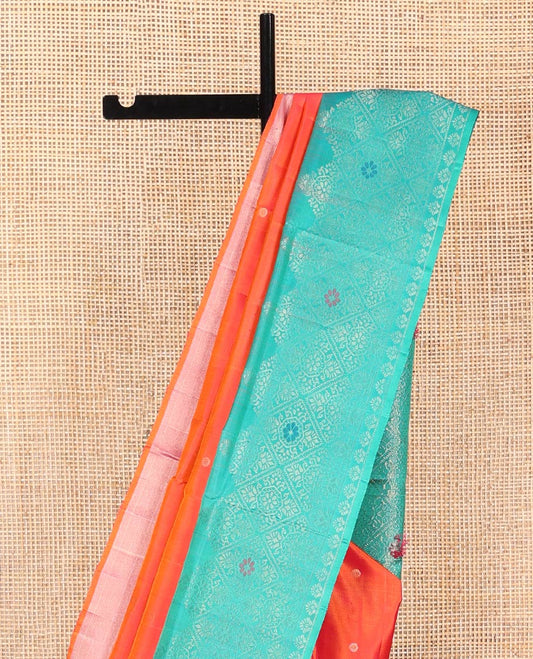 Orange Mayuri Soft Silk Saree, Elevated with Buttas All Over Its Body, Complemented by a Contrast Border of Jaal Designs, Grand Pallu of Jaal Designs, and Paired with a Contrast Blouse