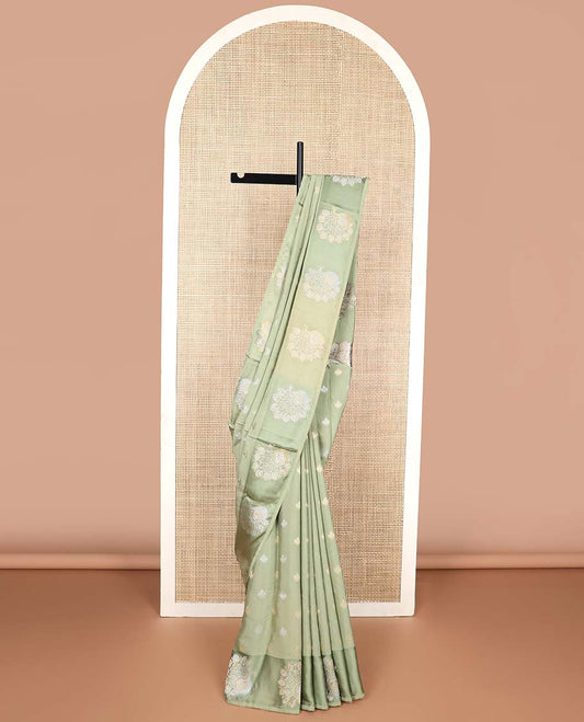 Green floral motifs mushru silk saree with self floral design border & argyle design pallu