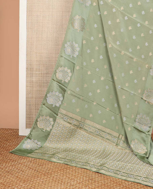 Green floral motifs mushru silk saree with self floral design border & argyle design pallu