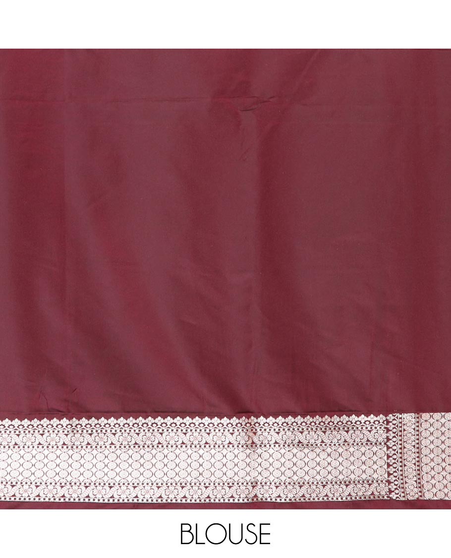 Maroon zari buttas and Pichwai cow buttas mushru silk saree, traditional design border, and zari-rich jaal pallu