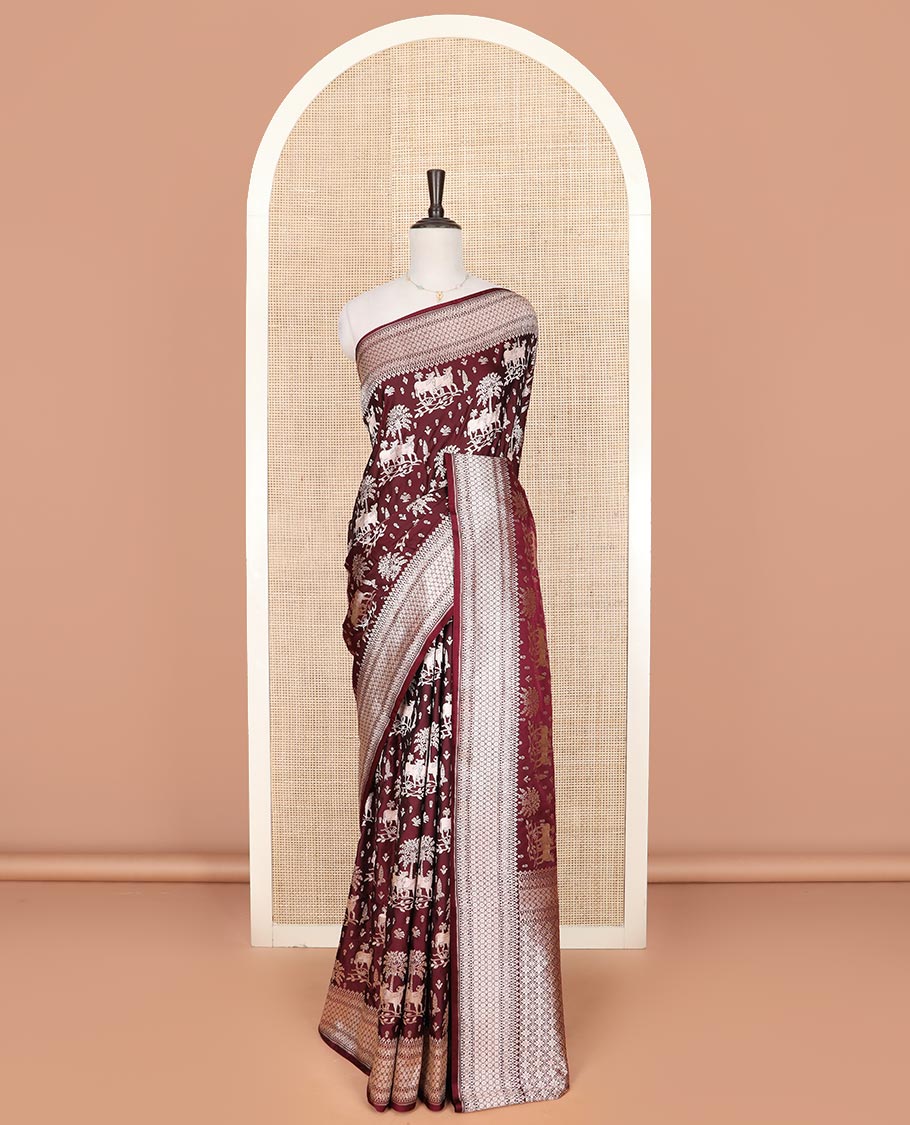Maroon zari buttas and Pichwai cow buttas mushru silk saree, traditional design border, and zari-rich jaal pallu