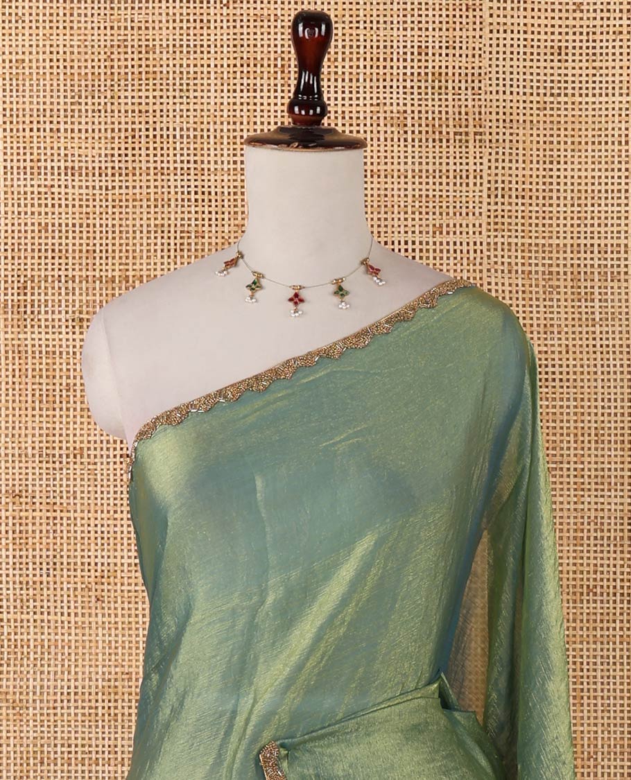 Parrot green fendy chiffon saree with hand work border & self pallu along with hand work blouse
