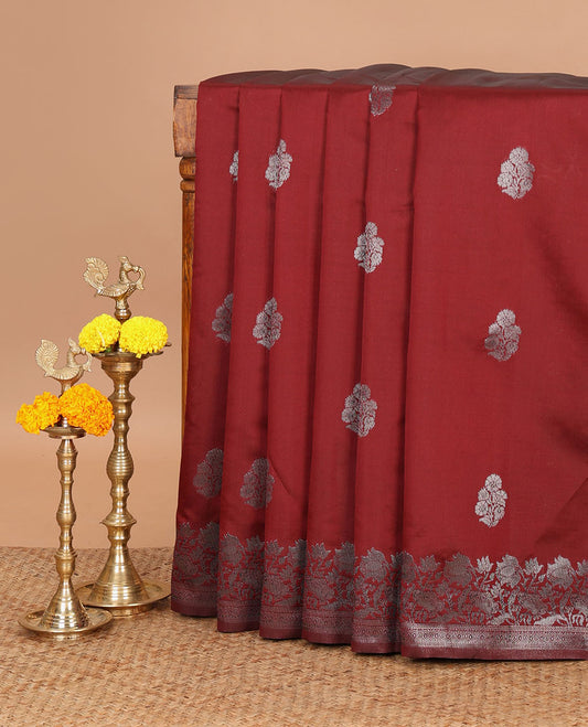 Maroon kanchi silk saree with flower zari buttas across its body, zari border of floral vine & ogee patterned pallu