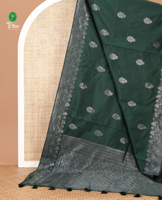 Green kanchi silk saree with flower zari buttas across its body, zari border of floral vine & ogee patterned pallu