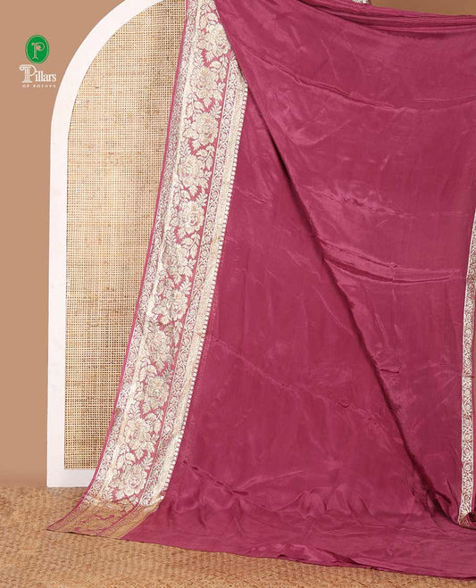 Onion pink plain crepe saree, zari border steeped with rose floral designs, plain pallu & blouse of zari polka dots