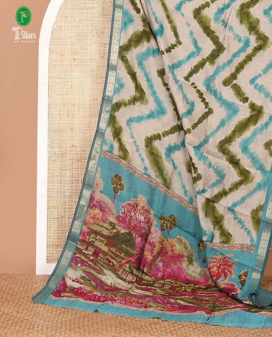 Blue zig-zag shibori printed Maheshwari silk saree,contrast peacock zari border, nature-theme scenery print pallu & butta print blouse