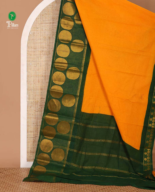 Orange full-plain sungudi cotton saree, contrast zari round motif big border, lining seer pallu & plain green blouse