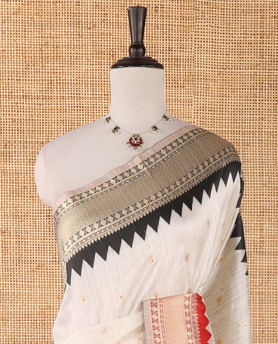 Half-white buttas banarasi jute saree, contrast traditional zari ganga-jamuna-style satin thread border, intricate pallu & plain blue blouse