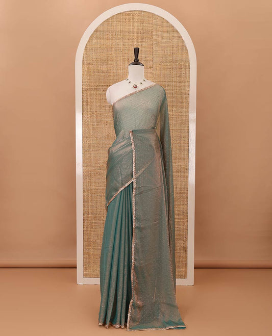 Blue Swarovski stone work embedded fendy-chiffon saree, scallop lace border & floral mixed embroidered blouse