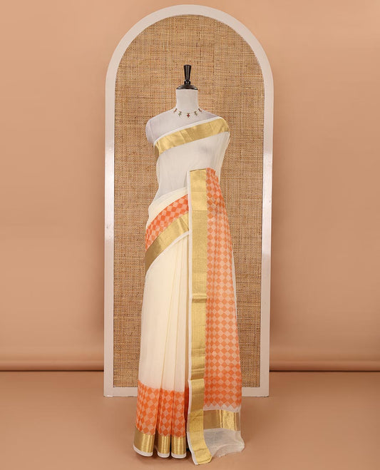 Cream with orange kerala cotton saree , diamond style printed with gold zari tissue bawanchi border & diamond design printed pallu with plain blouse