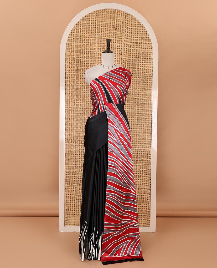 Borderless black-red color batik-style abstract-printed satin crepe saree, contrast-printed blouse