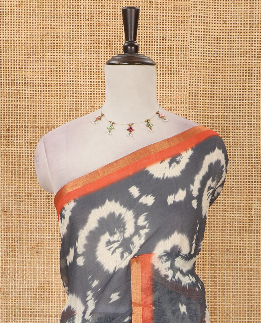 Grey shibori-style printed linen cotton saree, contrast zari piping border, kamlamkari floral printed pallu & contrast printed blouse