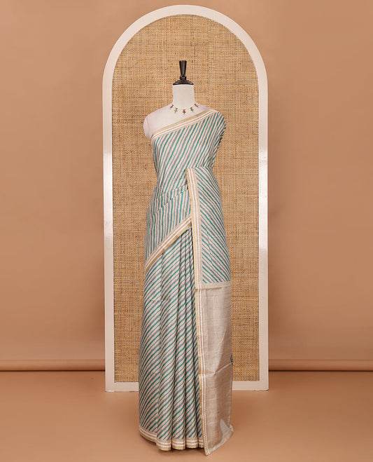 Peacock green lehariya-style striped semi-tussar saree, contrast resham thread triangle motifs border, diamond printed pallu & contrast printed blouse