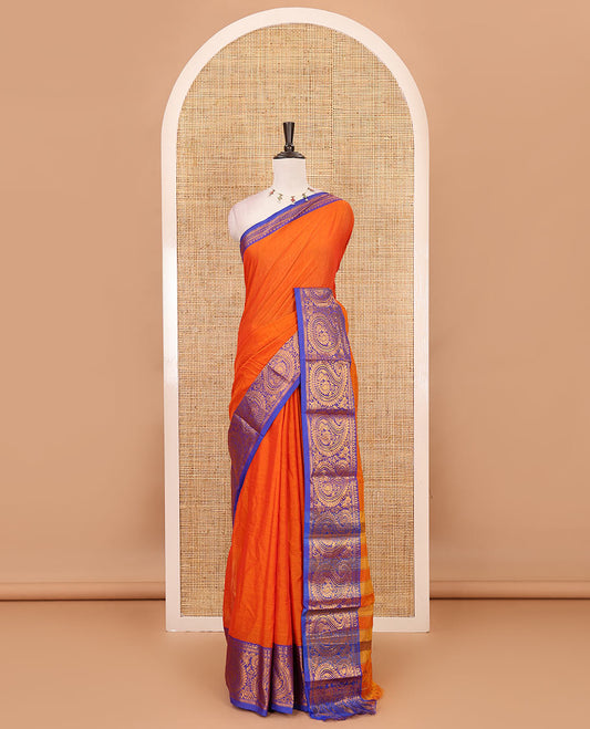 Orange plain design mercerised cotton saree, contrast traditional peacock enclosed manga border, striped pallu & matching blouse