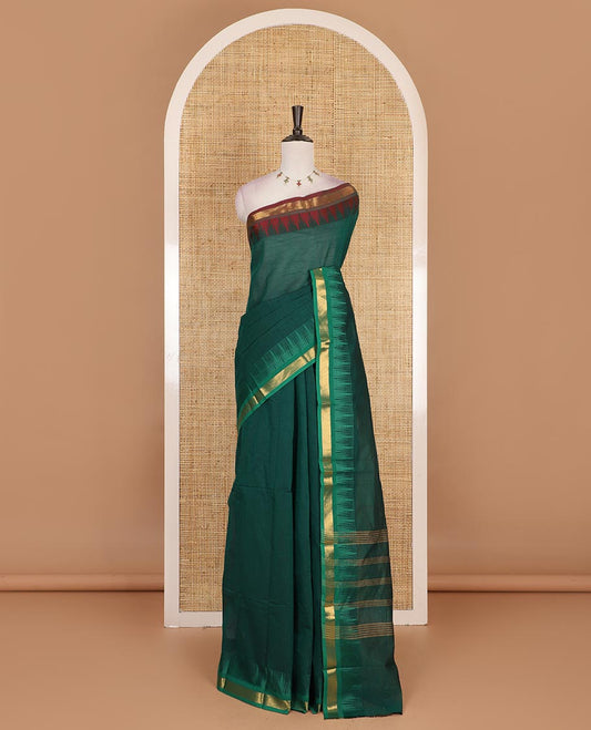 Green plain Chettinad cotton saree, contrast ganga jamuna temple zari border, striped pallu, and plain blouse