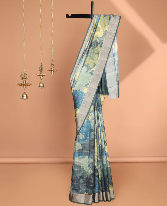 Green checks with floral printe semi tussar saree, gold zari bawanchi border & printed pallu along with checked blouse
