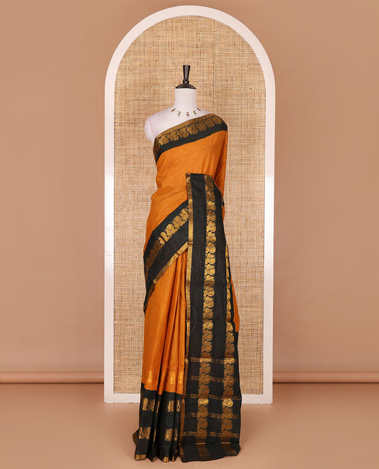 Mustard plain sungudi cotton saree, contrast annam motifs, gold zari woven border, zari striped, and zari design contrast blouse