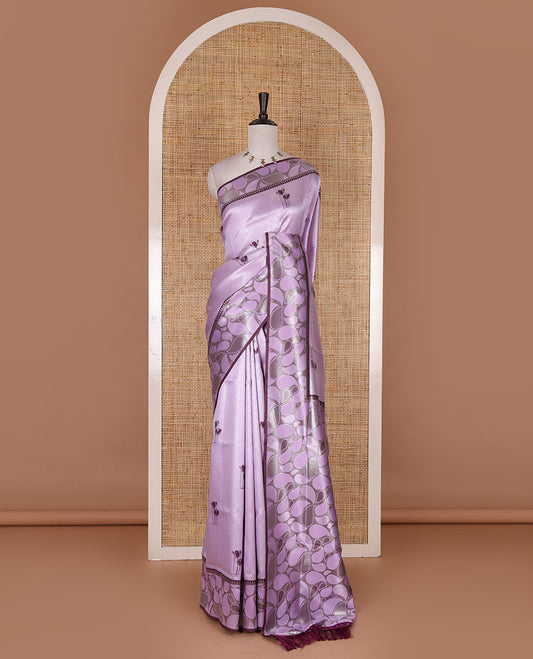 Purple jacquard kanchi silk saree, contrast border, and pallu steeped with paisley motifs with contrast zari design blouse