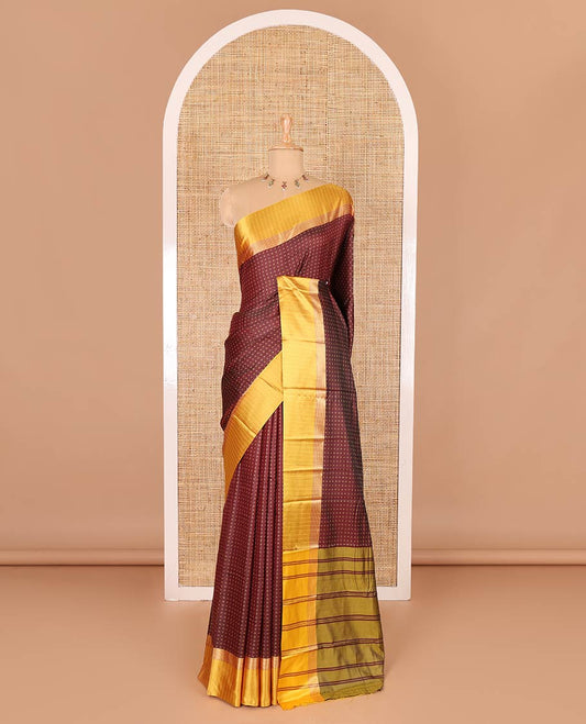 Maroon thread plus buttas semi-soft silk saree, contrast striped satin border, striped pallu, and contrast plus buttas blouse