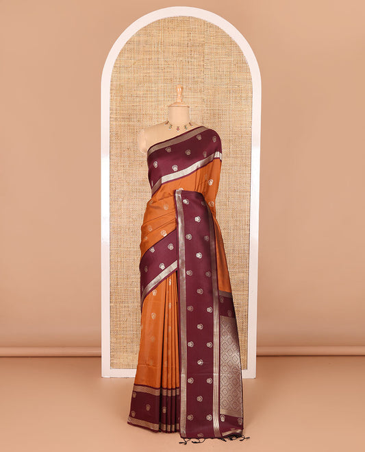 Rust zari buttas soft silk saree, contrast zari border of intricate designs, zari-rich jaal pallu, and a contrast zari design blouse