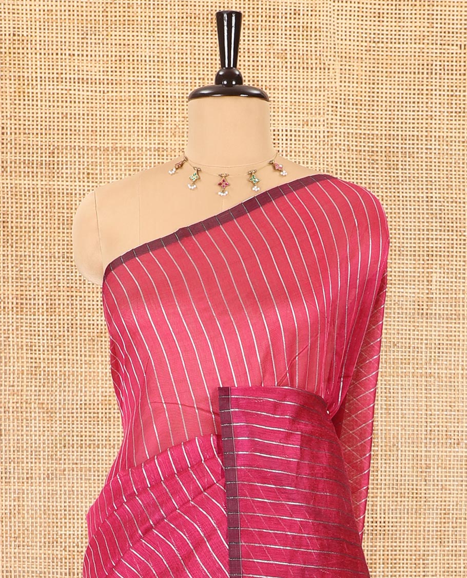 Borderless rani pink silver zari vertically striped khadi mul cotton saree, gleaming zari pallu and a matching blouse