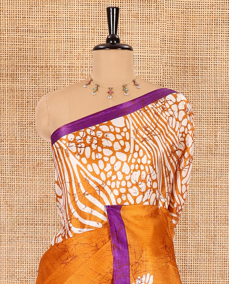 Mustard batik printed art Khadi cotton saree, batik printed border, batik printed pallu, and a contrast batik printed blouse
