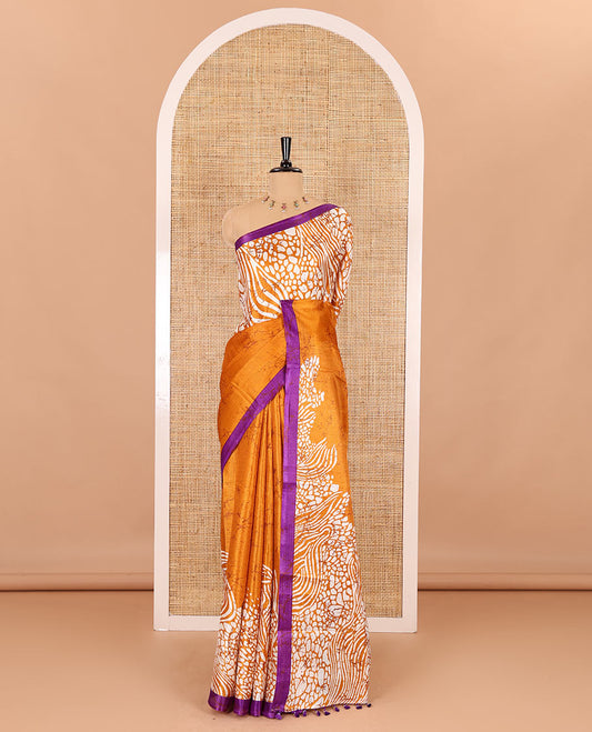 Mustard batik printed art Khadi cotton saree, batik printed border, batik printed pallu, and a contrast batik printed blouse