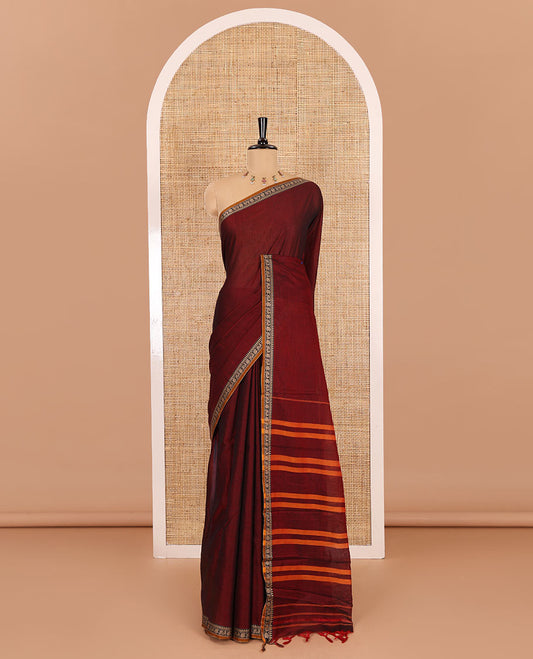 Maroon plain mercerised cotton saree, contrast temple traditional border, striped pallu, and a matching blouse