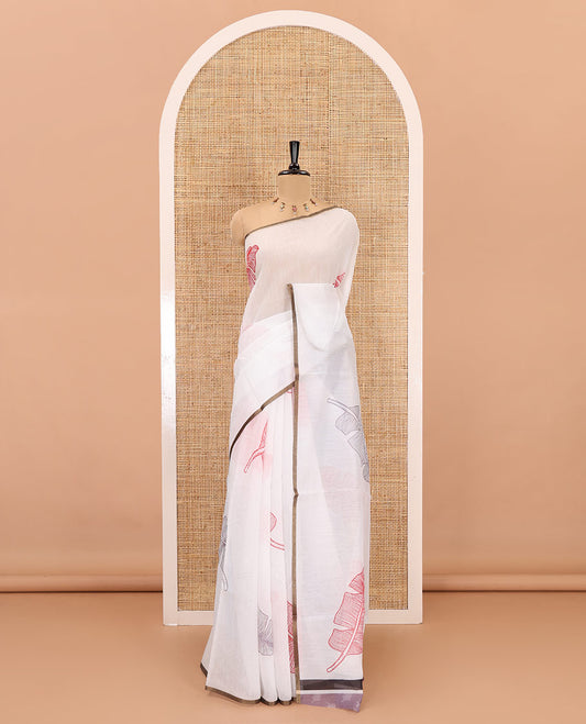 Borderless white big banana leaf motifs printed chanderi cotton saree, printed pallu, and contrast printed blouse