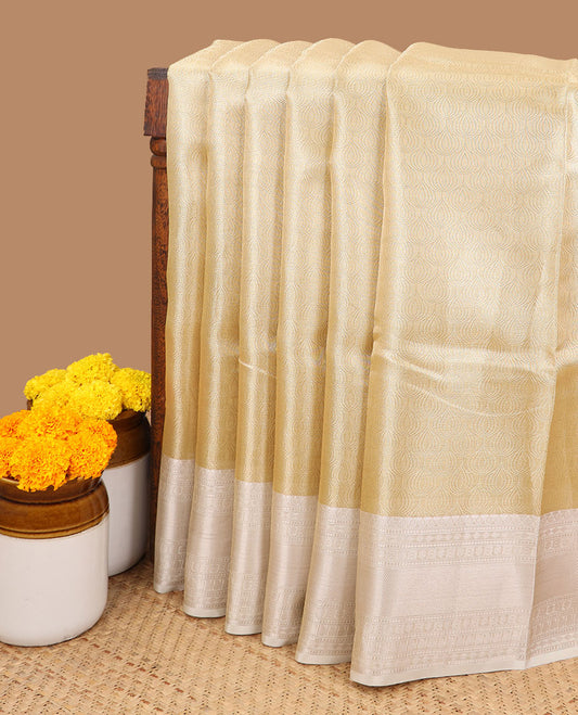 Gold with cream brocade zari weaving design banaras kora tissue saree with contrast zari jacquard border & rich pallu along with brocade blouse