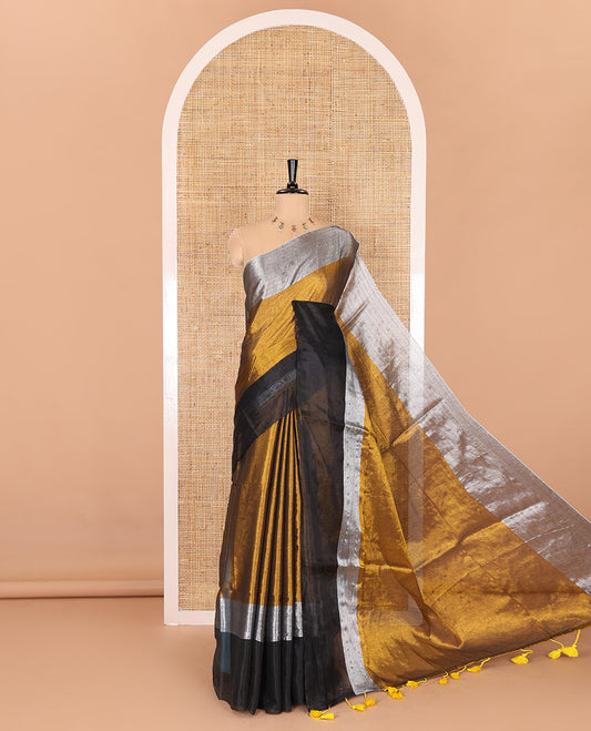 Gold plain khadi tissue cotton saree, golden and silver color plain border, plain pallu, and a matching blouse