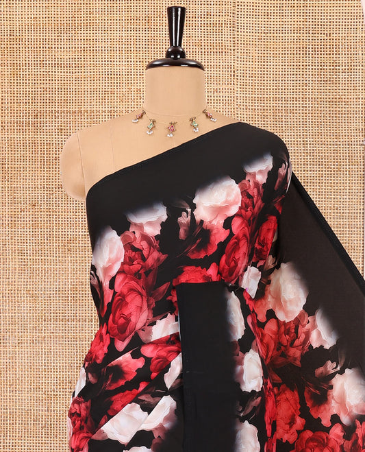 Borderless black and red floral printed satin crepe saree, floral printed pallu, and a matching floral printed blouse