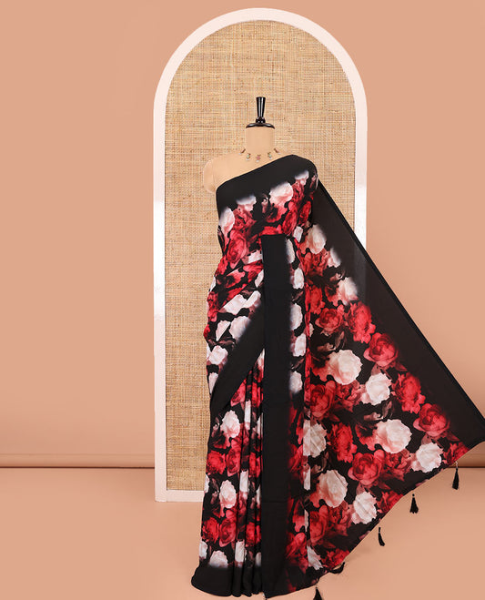 Borderless black and red floral printed satin crepe saree, floral printed pallu, and a matching floral printed blouse