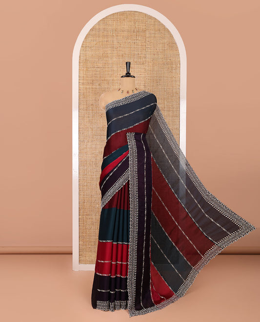 Multi-color fendy Swarovski stone work satin saree, scallop border of geometric motifs in Swarovski stone work, and a Swarovski stone work blouse