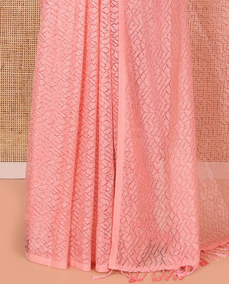 Borderless pink sparkling glittered russel net saree, self-pallu and a floral print with zig-zag embroidered blouse
