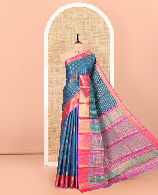 Blue zari buttas semi-soft silk saree, contrast plain zari border, contrast zari buttas steeped pallu, and a contrast zari design blouse