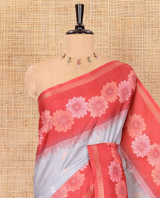 Grey floral buttas katan silk saree, contrast floral motifs border, pallu adorned with floral designs, and a contrast lotus flower printed blouse
