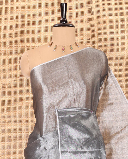 Borderless grey plain khadi tissue saree self pallu with tassels  and a matching blouse