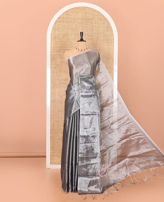 Borderless grey plain khadi tissue saree self pallu with tassels  and a matching blouse