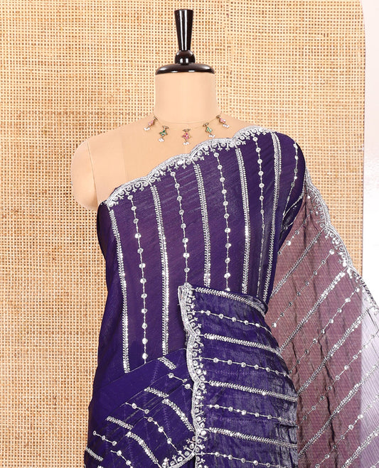Violet Fendy Chiffon Saree Highlighted with Sequins and Thread Stripes Embroidery, Scallop Embroidered Border, Elegantly Embroidered Pallu, and Paired with a Matching Blouse
