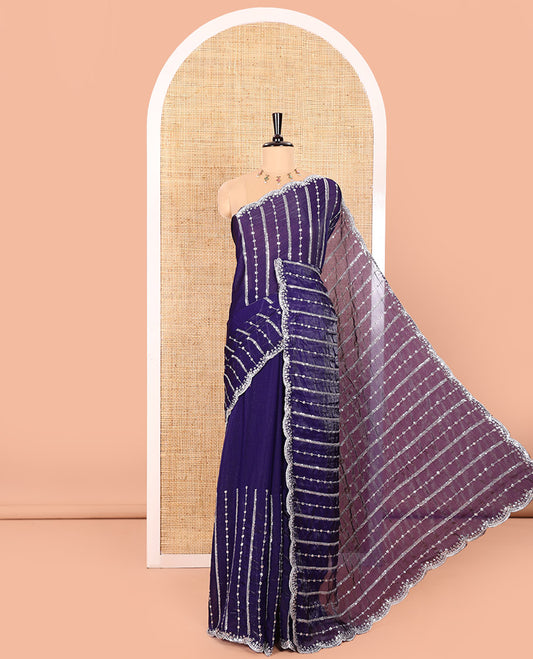 Violet Fendy Chiffon Saree Highlighted with Sequins and Thread Stripes Embroidery, Scallop Embroidered Border, Elegantly Embroidered Pallu, and Paired with a Matching Blouse