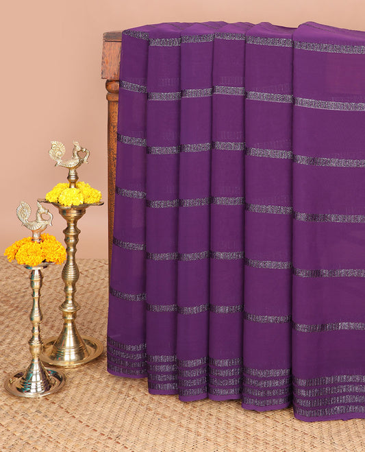Wine color striped antique zari design georgette saree with antique zari border & self pallu along with tie dye blouse